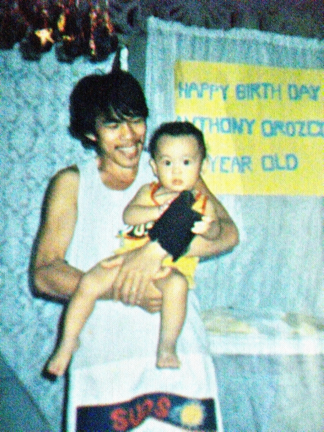 Me with my father during my first Birthday 
